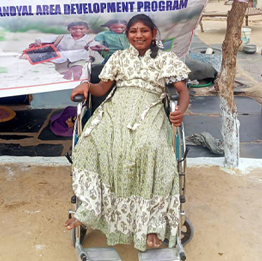 Girl seating on a new wheelchair